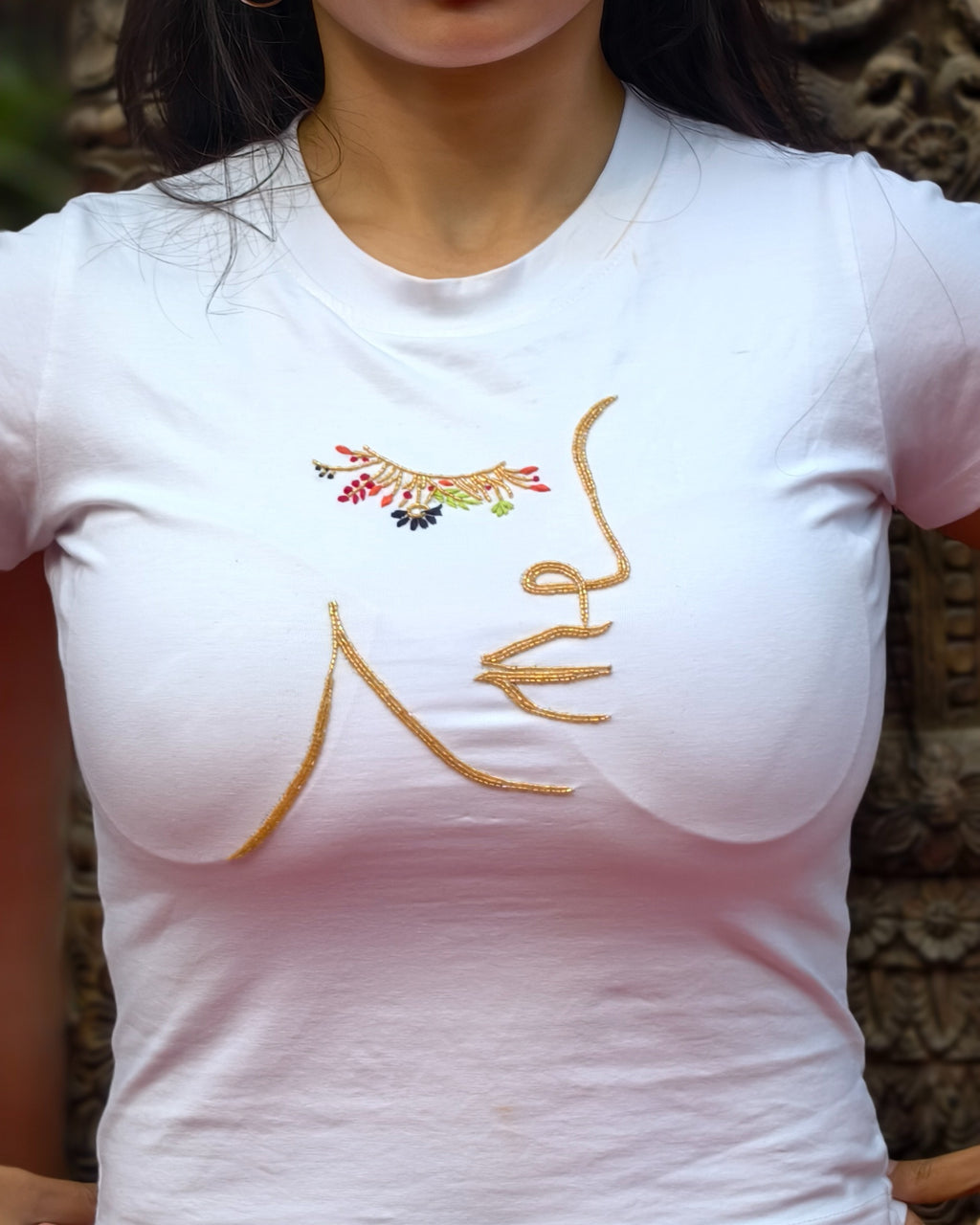 Ayame Top - close-up of hand-stitched multi-color thread detailing
