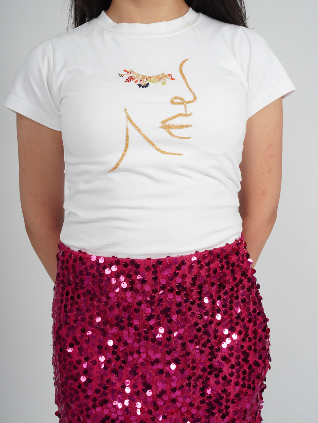 Close-up of hand-embroidered Cutdana and multicolor threadwork on Ayame Top