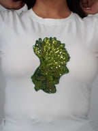 Close-up of green sequins beads and gold Cutdana hand embroidery on Ayla Top
