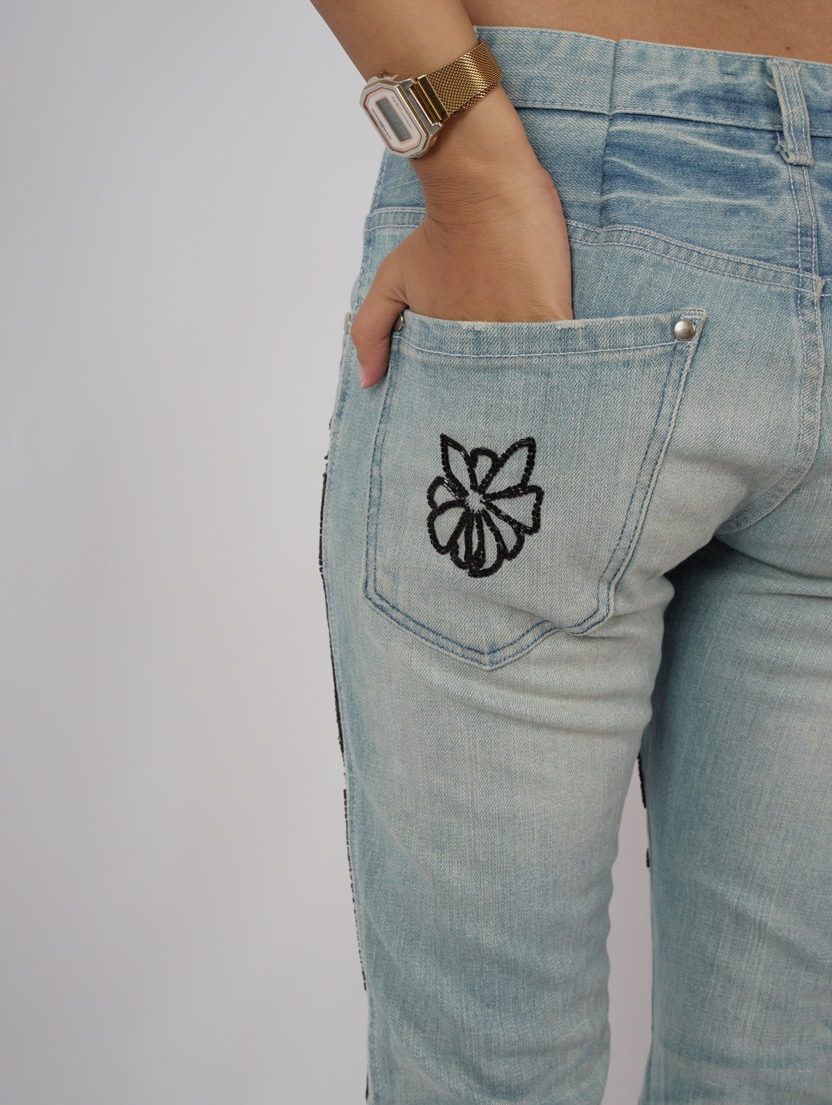 Bloom Story Denim left back pocket – embroidered denim detail