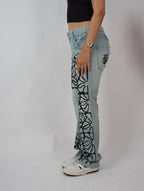 Bloom Story Denim side leg view – handcrafted beadwork denim