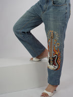 Burning Strings Denim embroidery close-up – flame threadwork embroidery