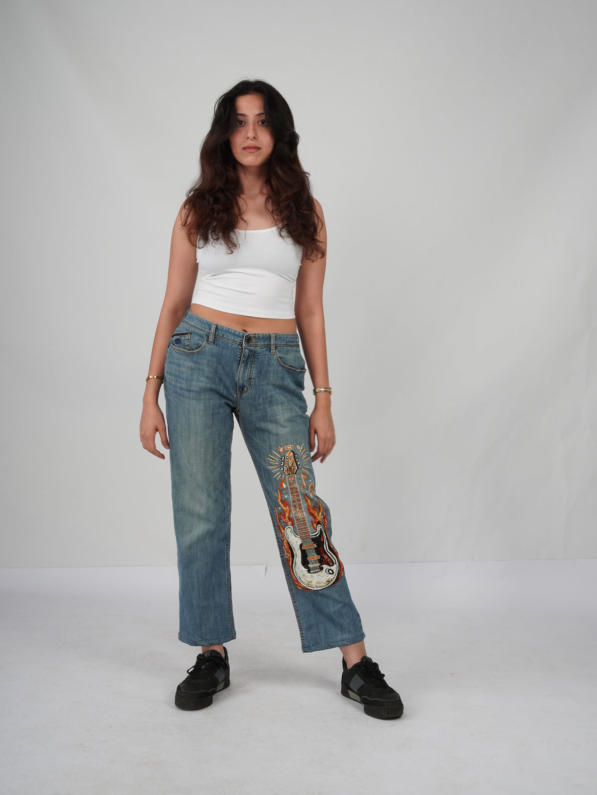 Burning Strings Denim front view – handcrafted beadwork denim