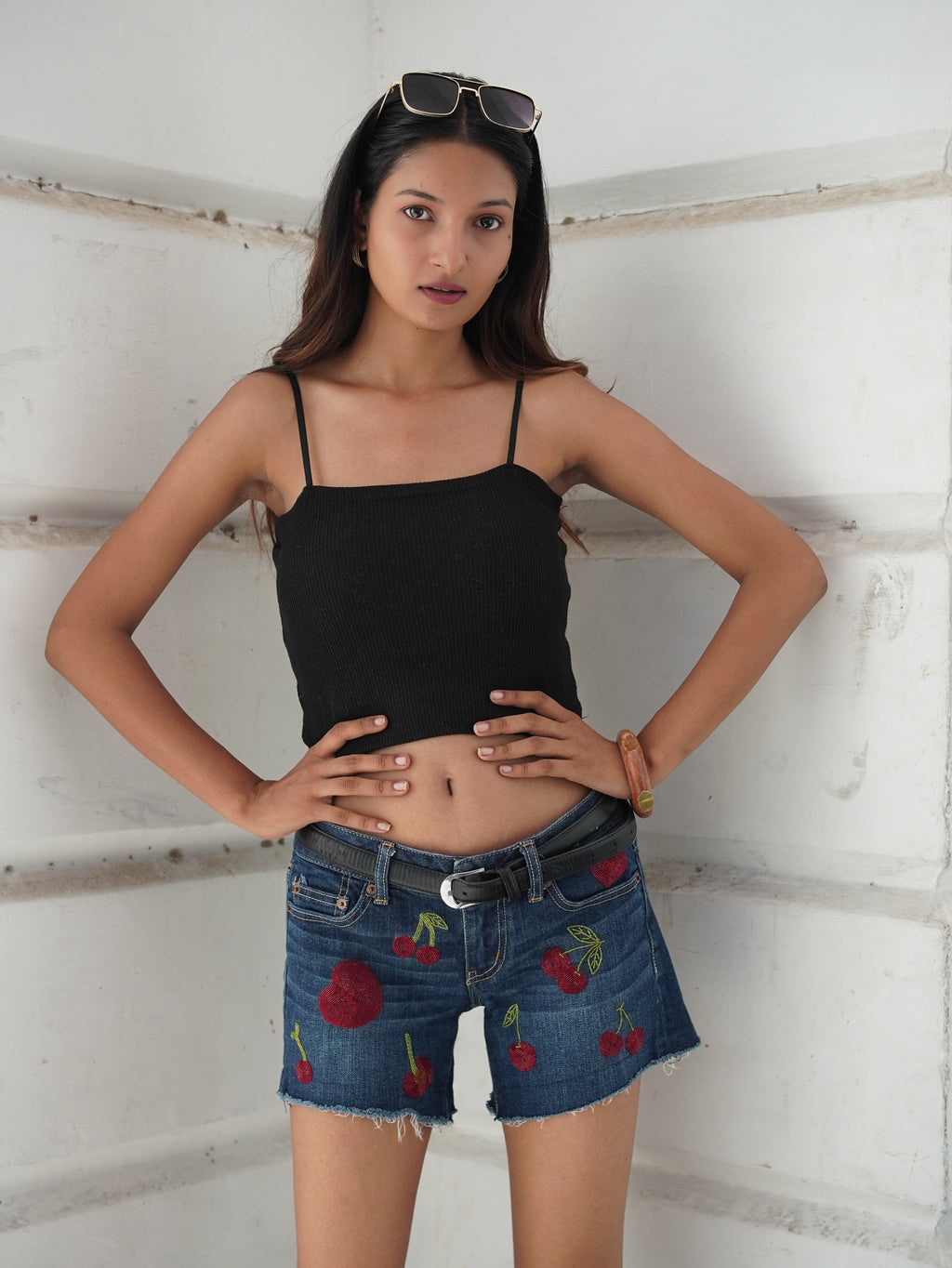 Cherry Pop Denim Shorts - close-up of hand embroidery detailing
