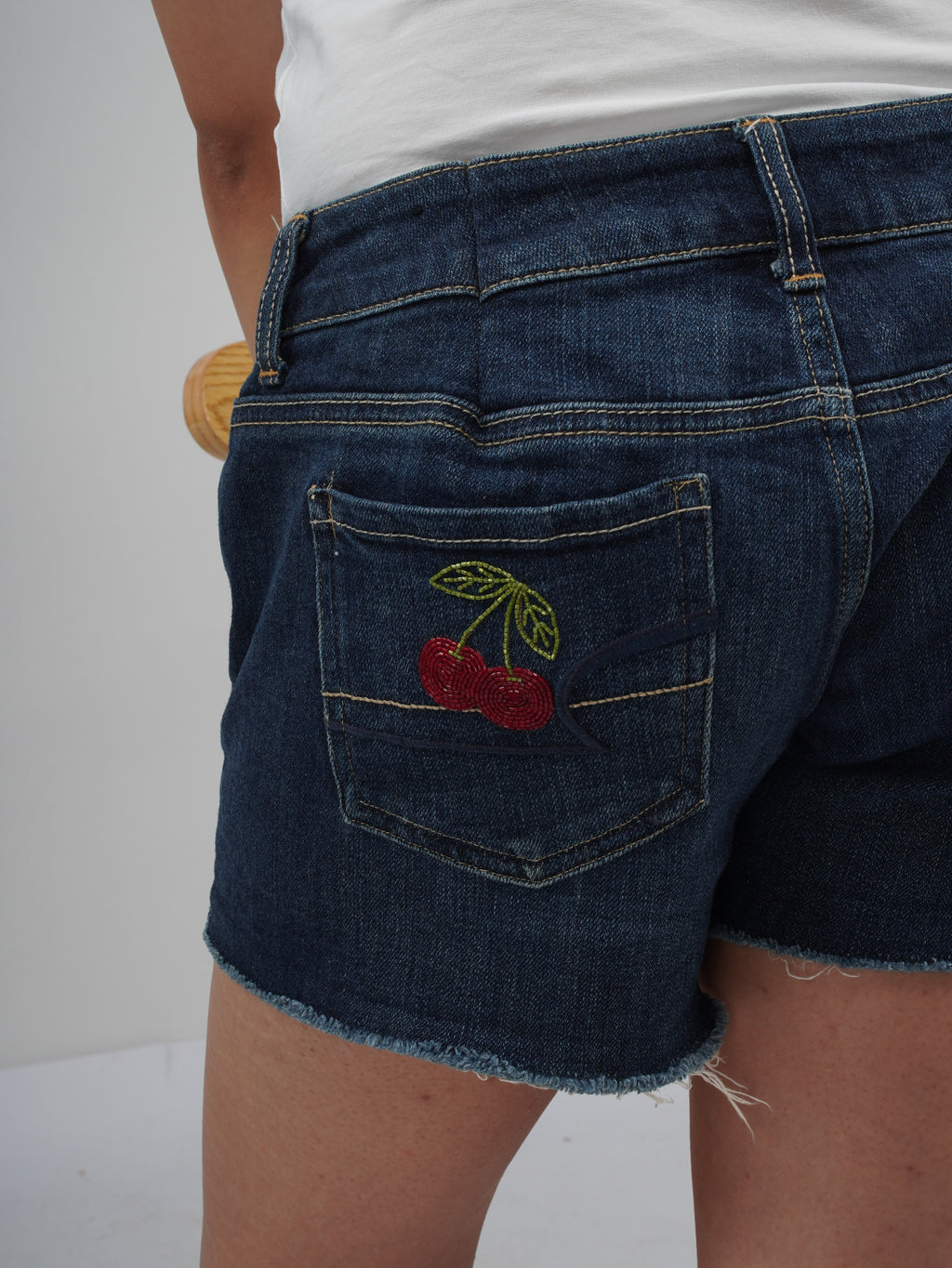 Cherry Pop Denim Shorts left back pocket – embroidered denim detail