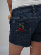 Cherry Pop Denim Shorts left back pocket – embroidered denim detail