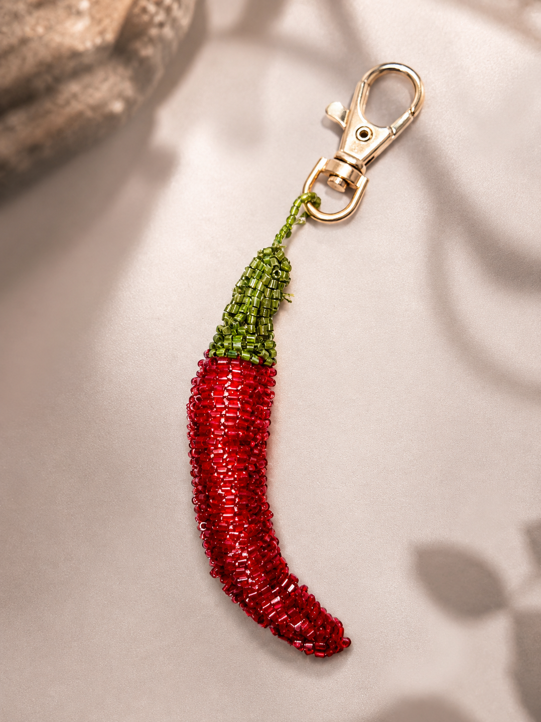 Beaded red chili pepper charm with green stem