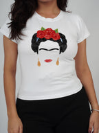 Close-up of hand-embroidered portrait artwork on the Still, I Rise Top
