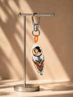 Dreamer charm hanging from silver-tone clasp