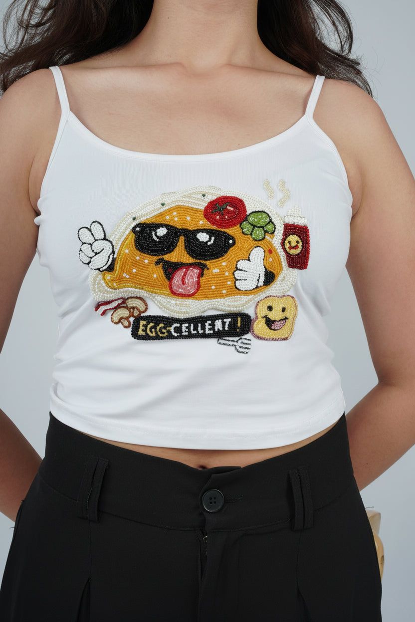 EGGZAA Top white cotton top with playful hand-embroidered graphic