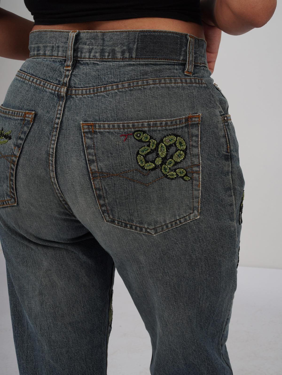 Emerald Serpent Denim right back pocket – embroidered denim detail