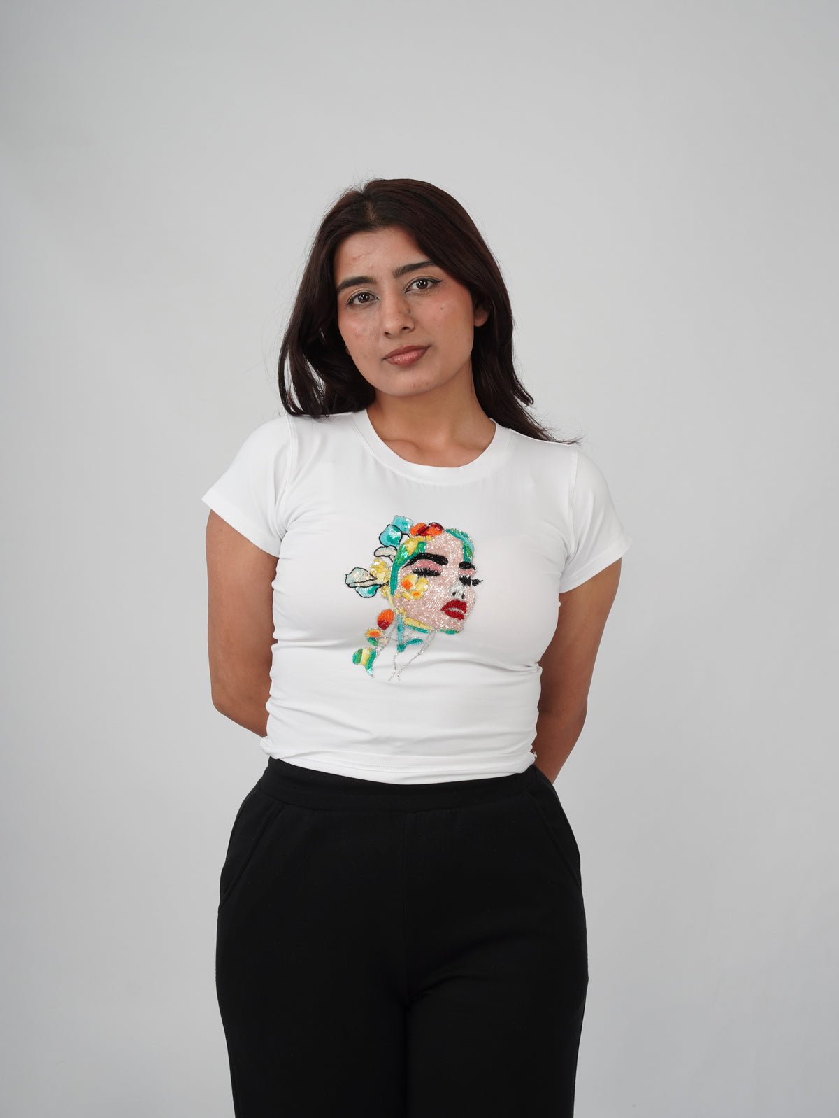 Fleur de Femme Top white cotton top with hand-embroidered feminine portrait and floral artwork