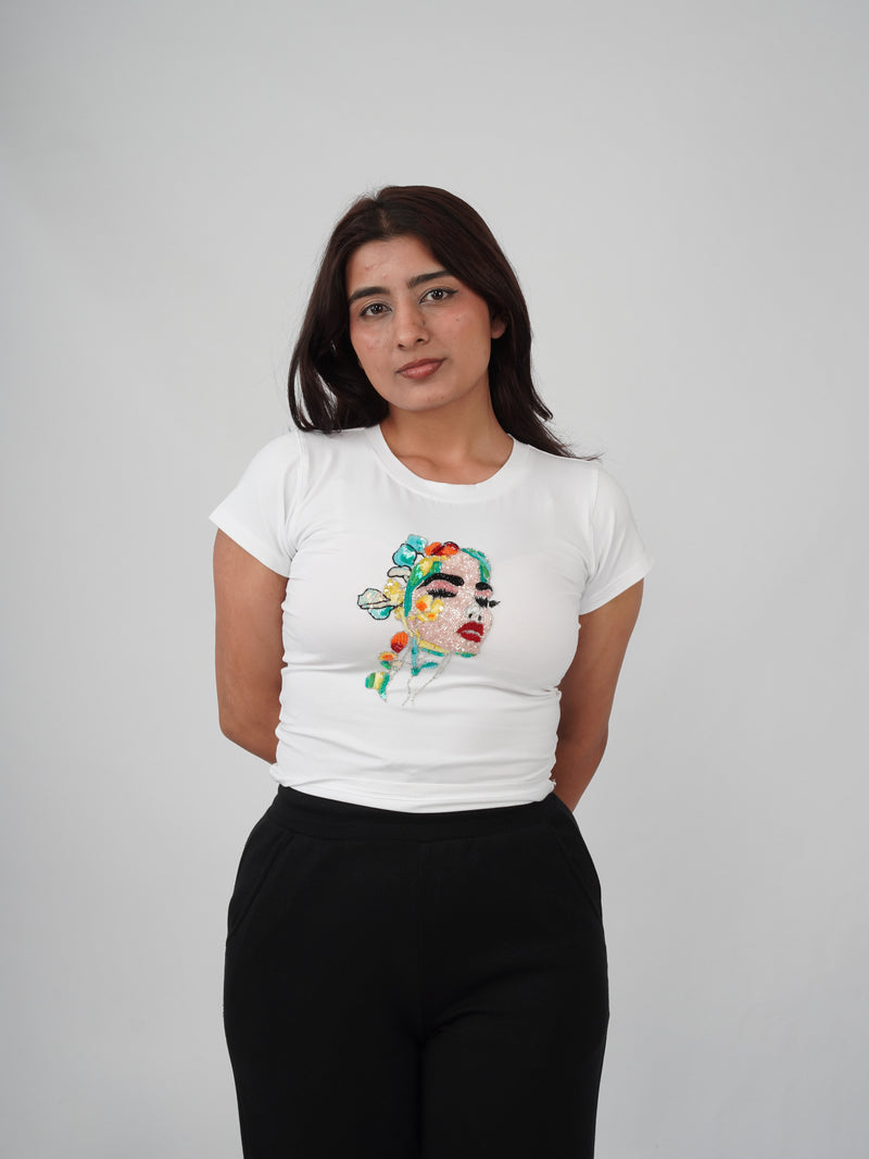 Fleur de Femme Top white cotton top with hand-embroidered feminine portrait and floral artwork