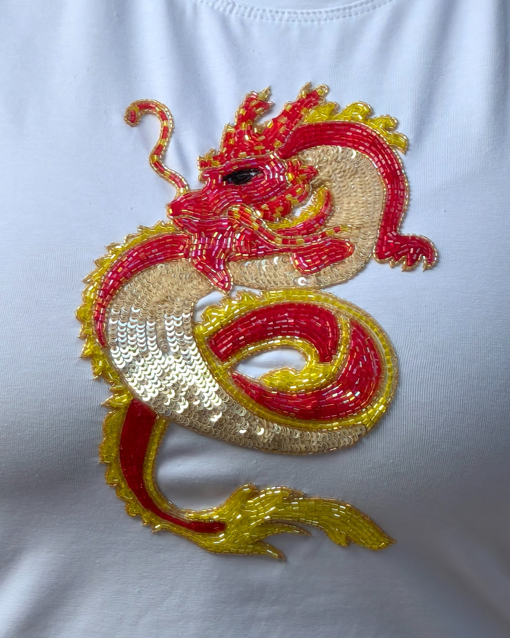 Ignara Top - close-up of hand-stitched embroidery detailing