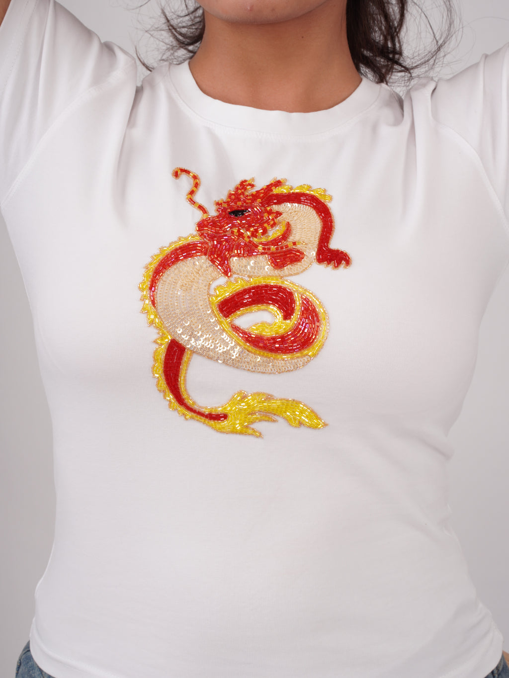 Close-up of hand-embroidered Cutdana and sequin work on Ignara Top