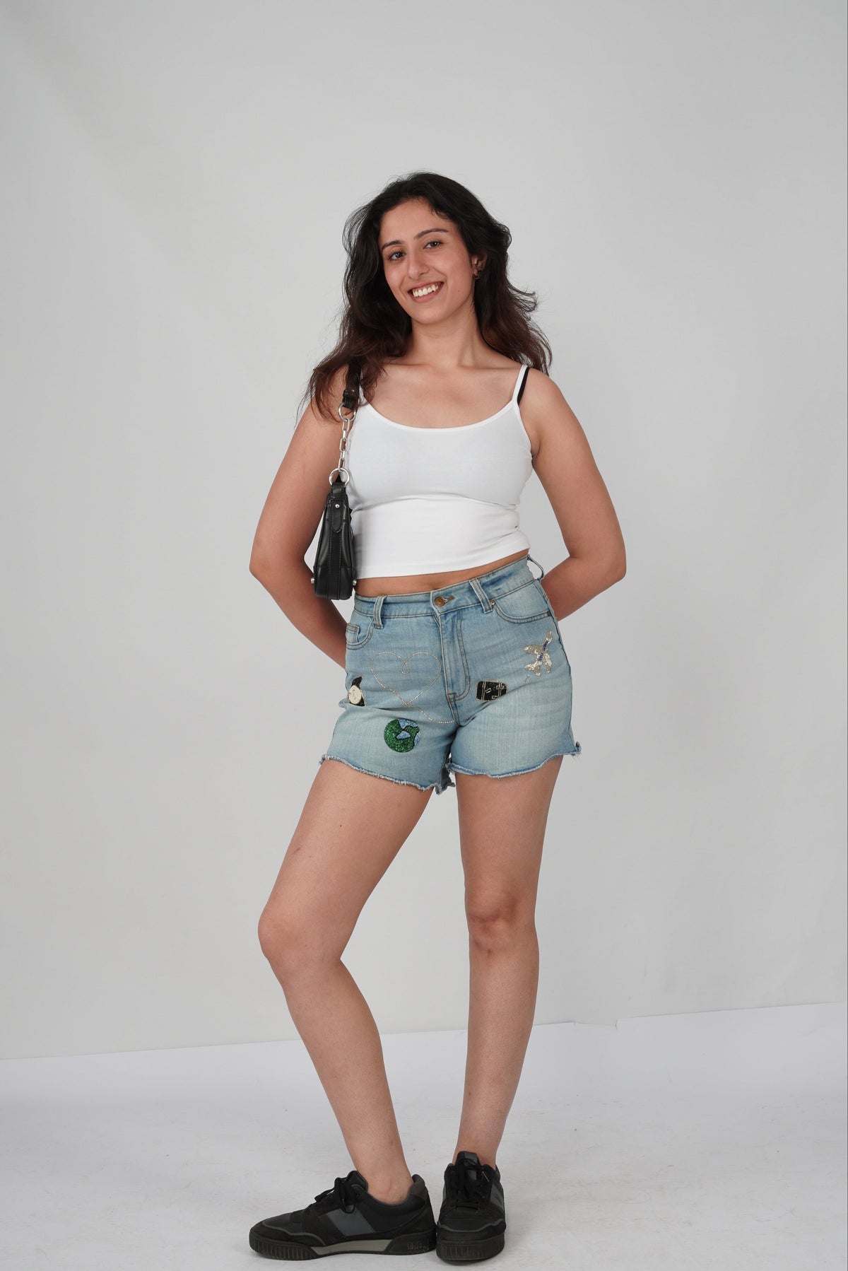 Jet Set Shorts front view – hand-embroidered travel denim