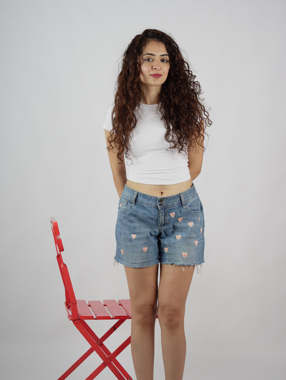 Love Glitch Shorts front view – hand-embroidered heart denim