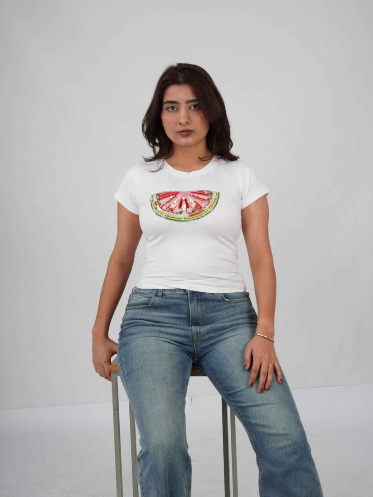Melina Top white top with intricate hand-embroidered detailing