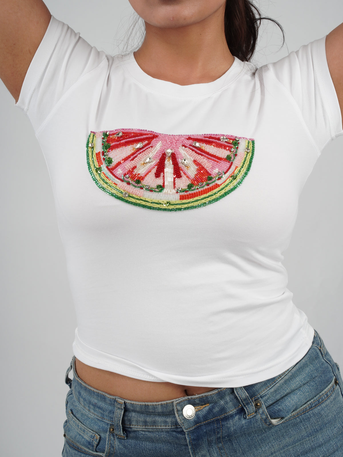 Melina Top white top showcasing intricate hand embroidery