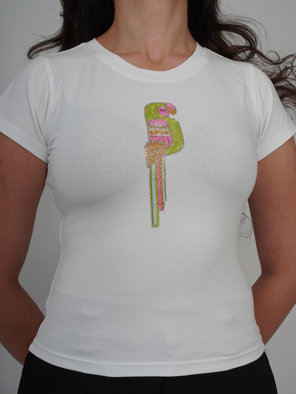 Perro Top white top showcasing intricate hand-stitched Cutdana embroidery