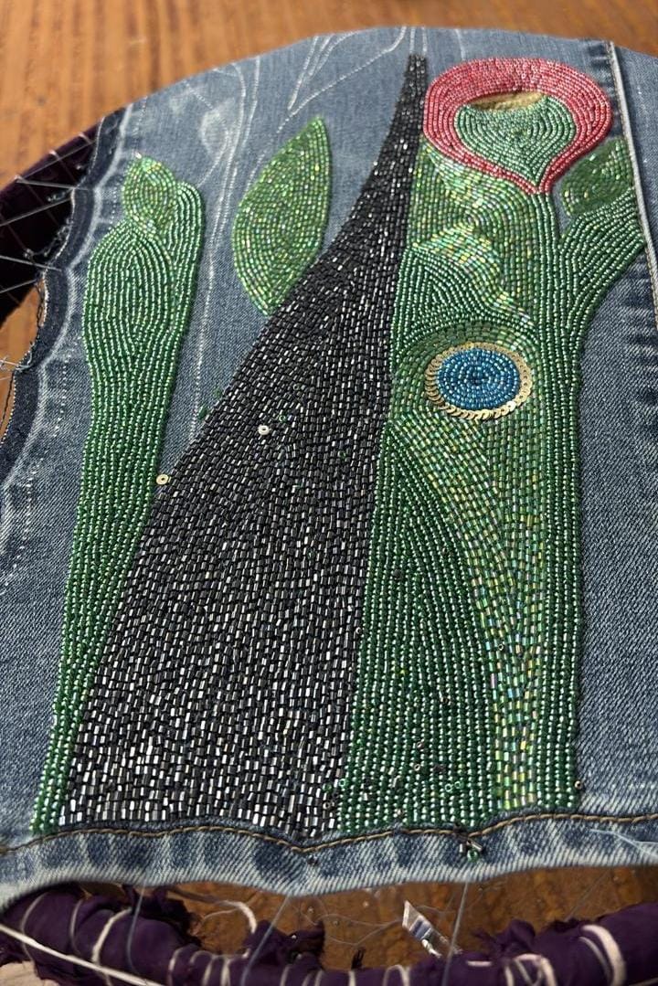 Vintage Muse Denim - close-up of hand embroidery detailing