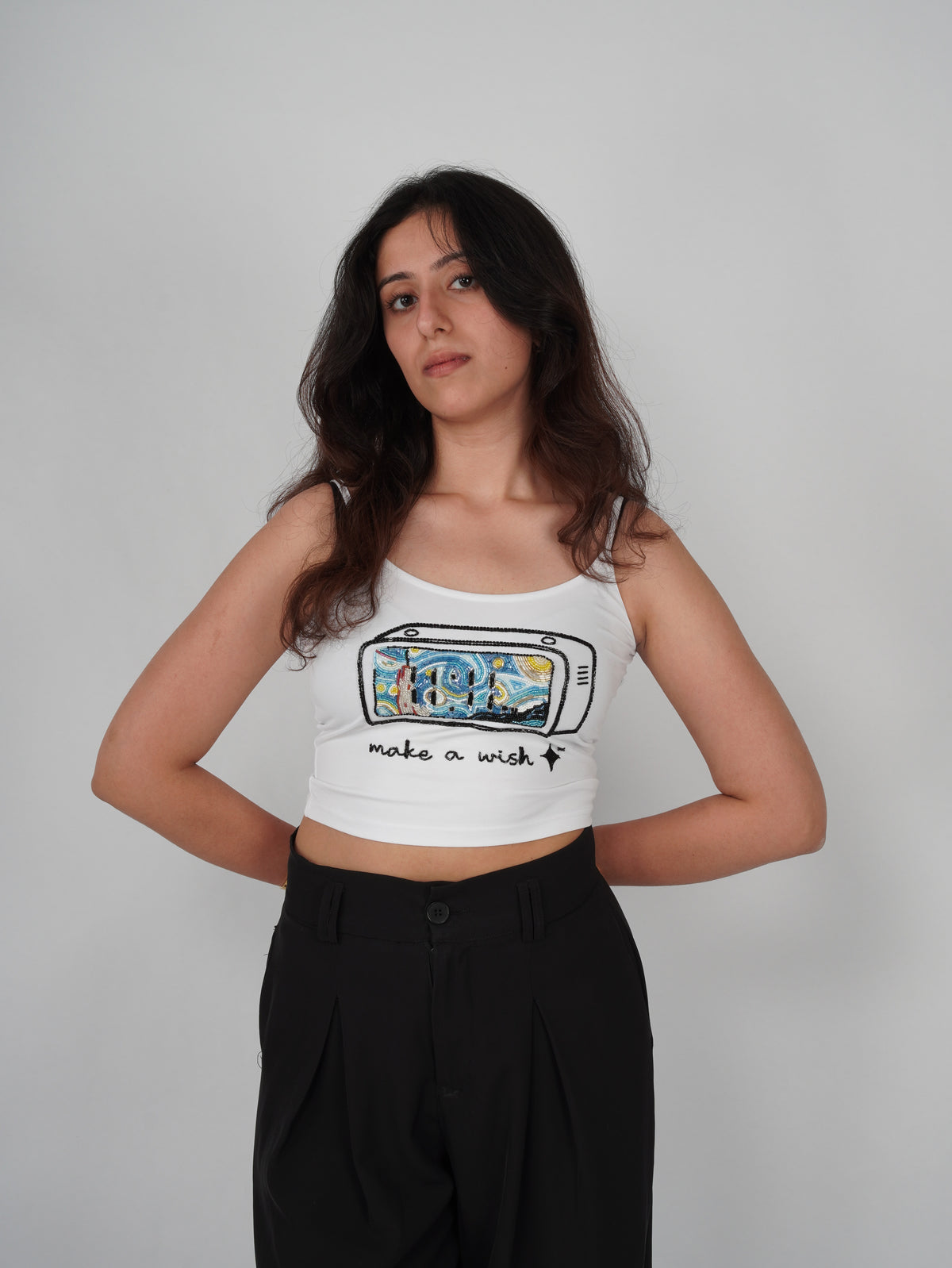 ELEVEN Make a Wish Top showcasing detailed hand-embroidered artwork